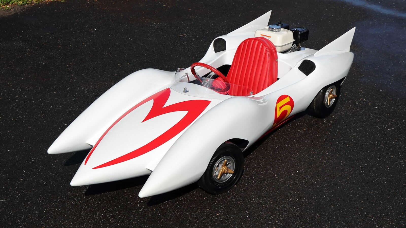 Mach 5? Speed Racer car? Or just a Elvis tribute build?