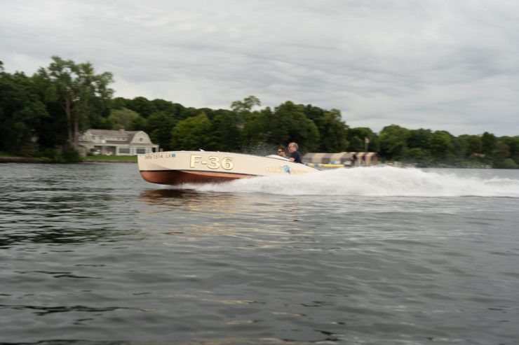 Bugbite Mahogany Speedboat On Water 1