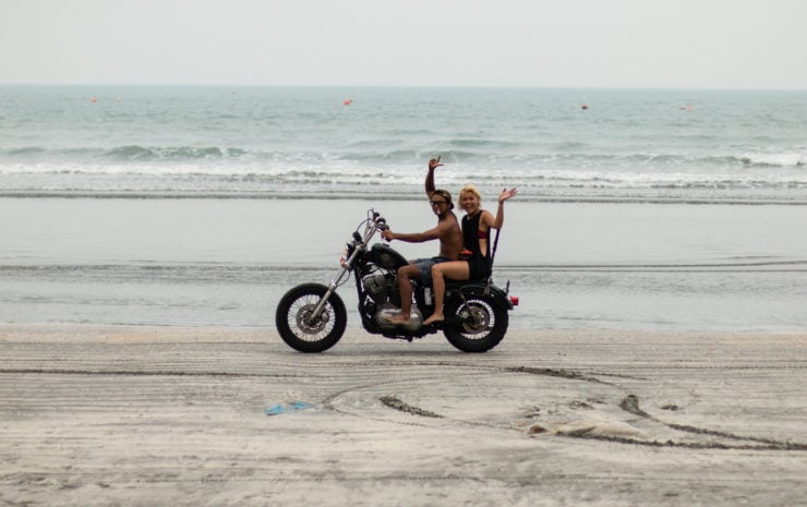 Waving From A Motorcycle