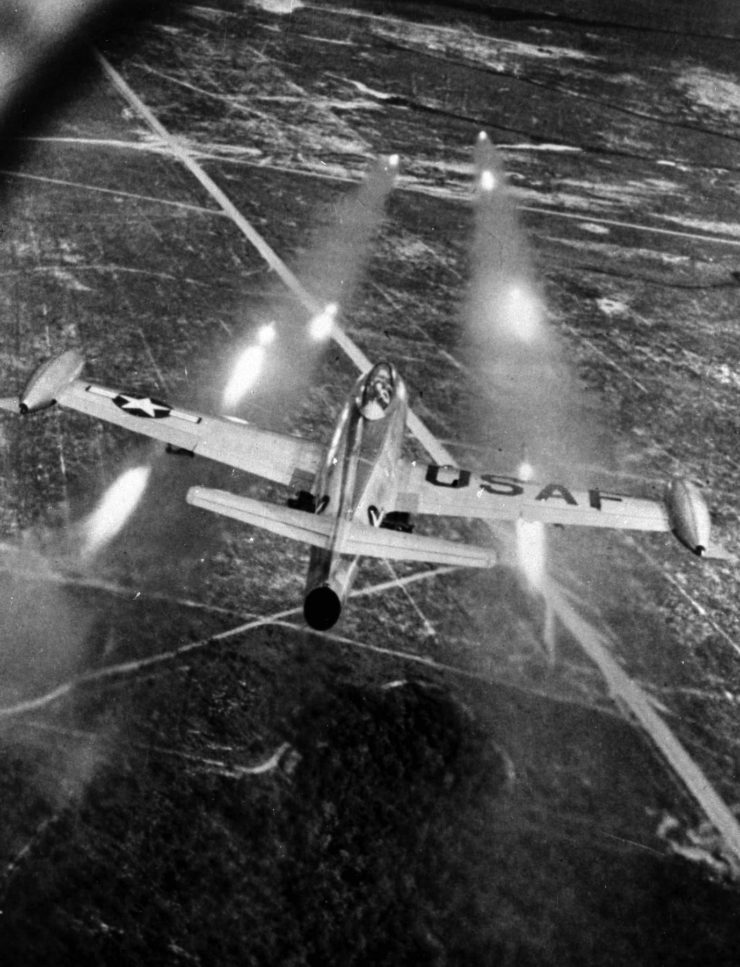 An F-84E attacks a ground target with rockets - National Museum of the U.S. Air Force