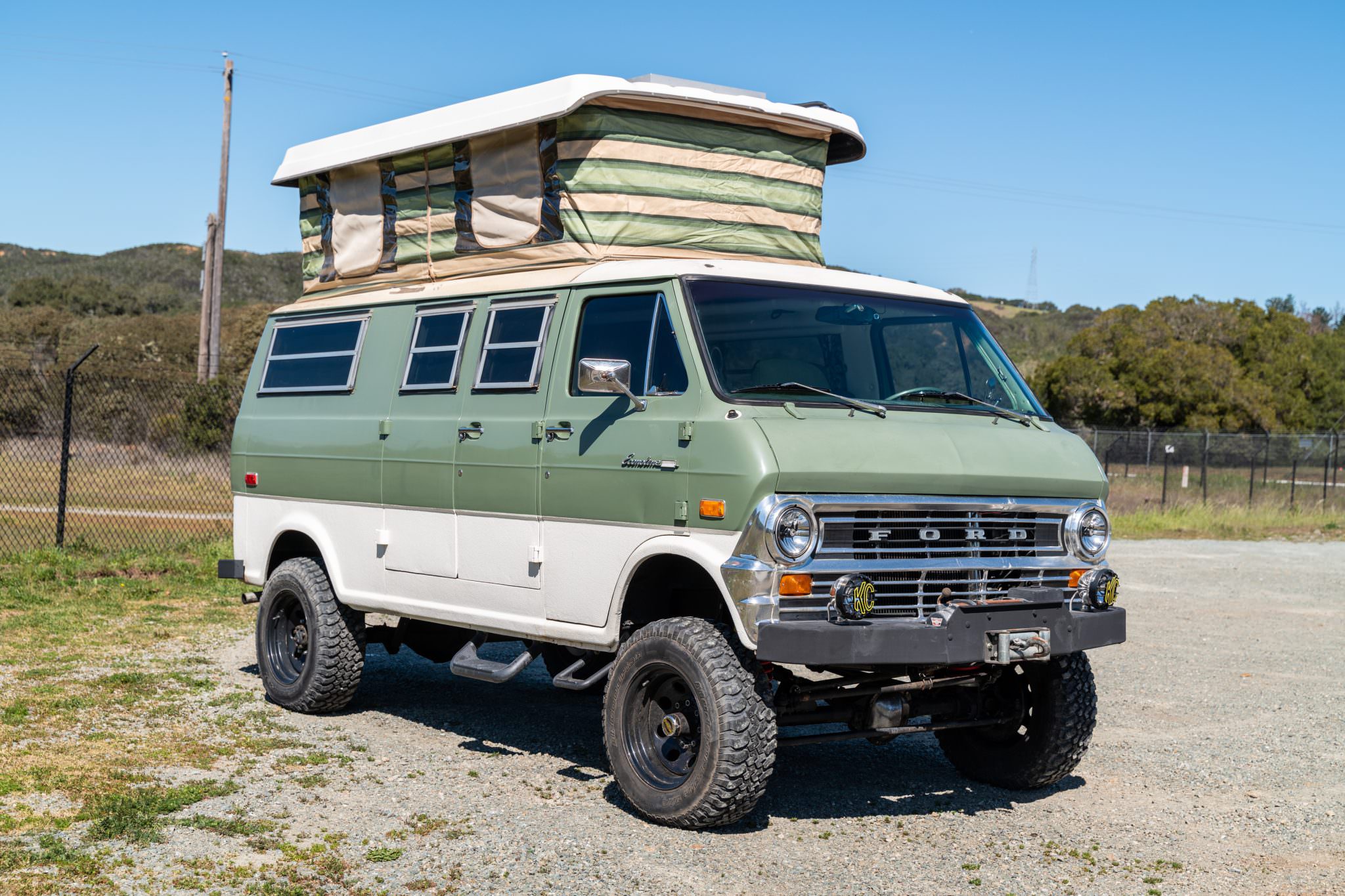 Sportsmobile's Off-Road Classic 4x4 Ford Camper Van With a 'Penthouse' for  $225,000