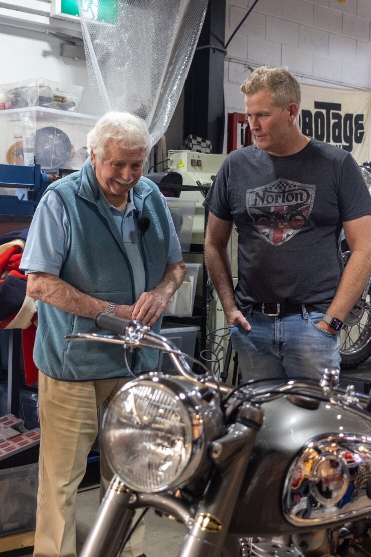 Horace Jowsey looking at his Norton