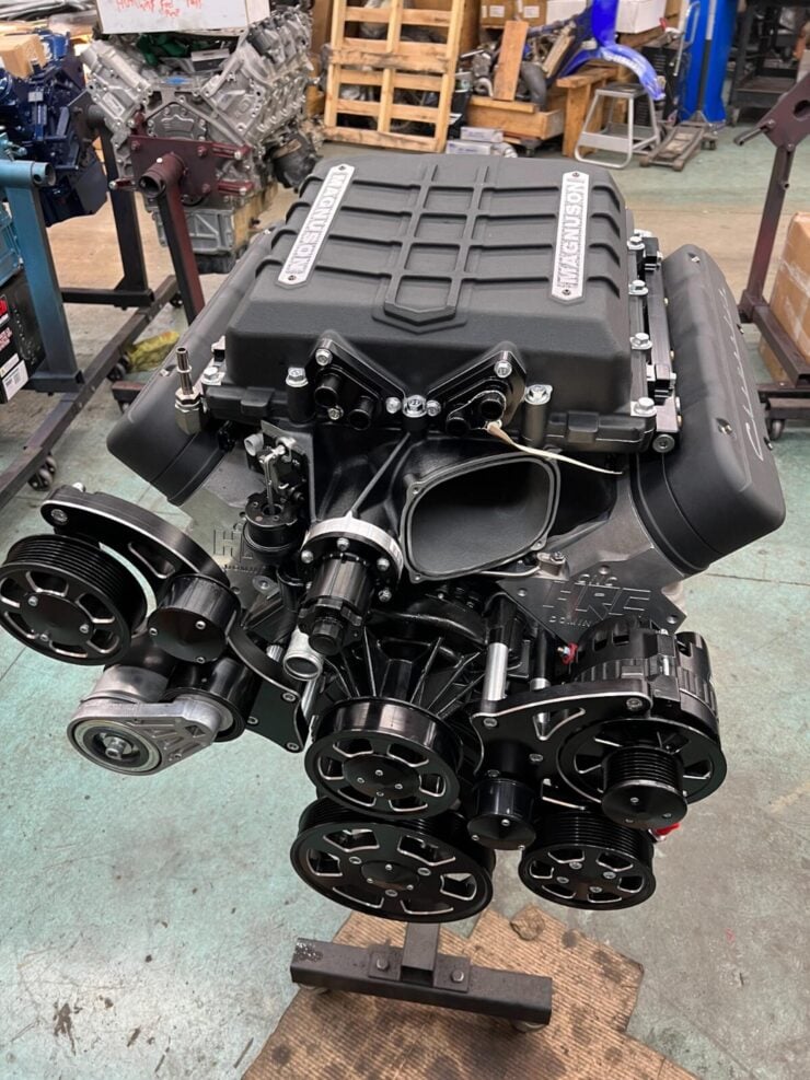 This is a 427 cubic inch supercharged LS-based crate engine from The Hot Rod Company, each one is built around a Dart LS Next aftermarket block and intended as a turnkey package for high-powered GM hot rods and restomods.